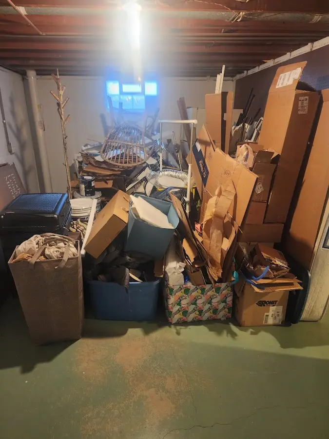 Roll-off dumpster container at job site for 20 Yard Dumpster Rental in Asbury Lake